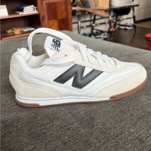 New Balance Cream and Black Sneakers